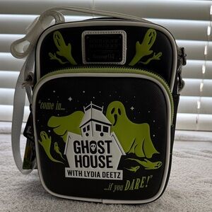Loungefly Beetlejuice Beetlejuice Ghost House Glow-in-the-Dark Crossbody Bag.